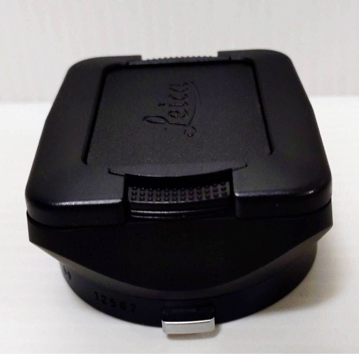 Leica LEICA Plastic Lens Hood with Cap and Box Camera Parts [d1217110579]