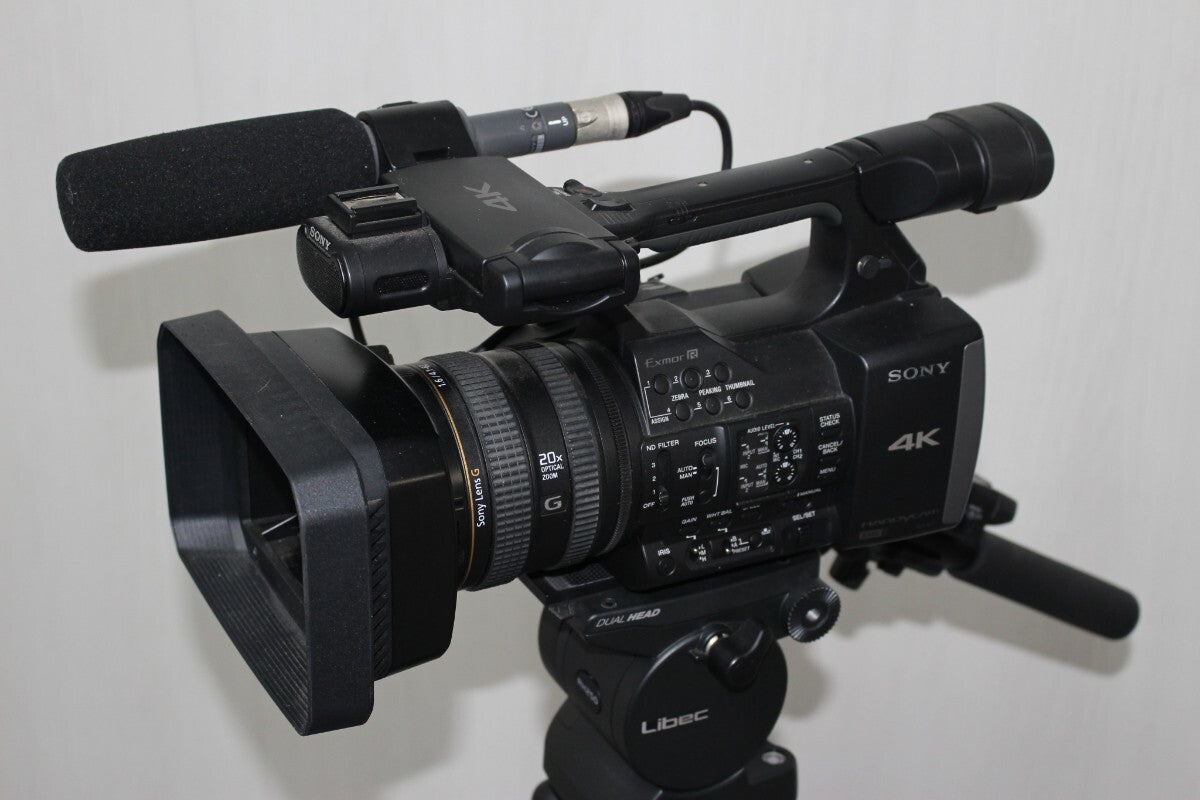 Sony FDR-AX1 4K Video Camera with Tripod Set [f1236263080]