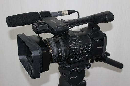 Sony FDR-AX1 4K Video Camera with Tripod Set [f1236263080]