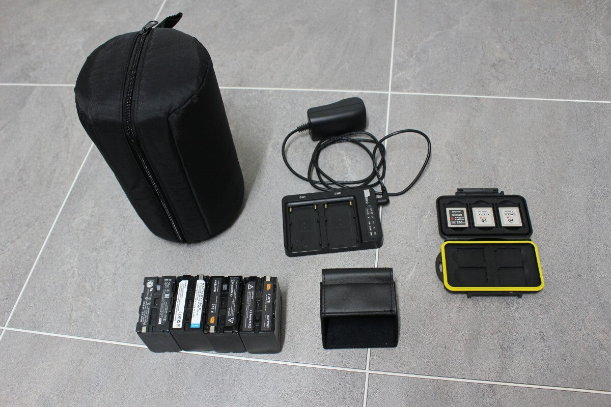 Sony FDR-AX1 4K Video Camera with Tripod Set [f1236263080]