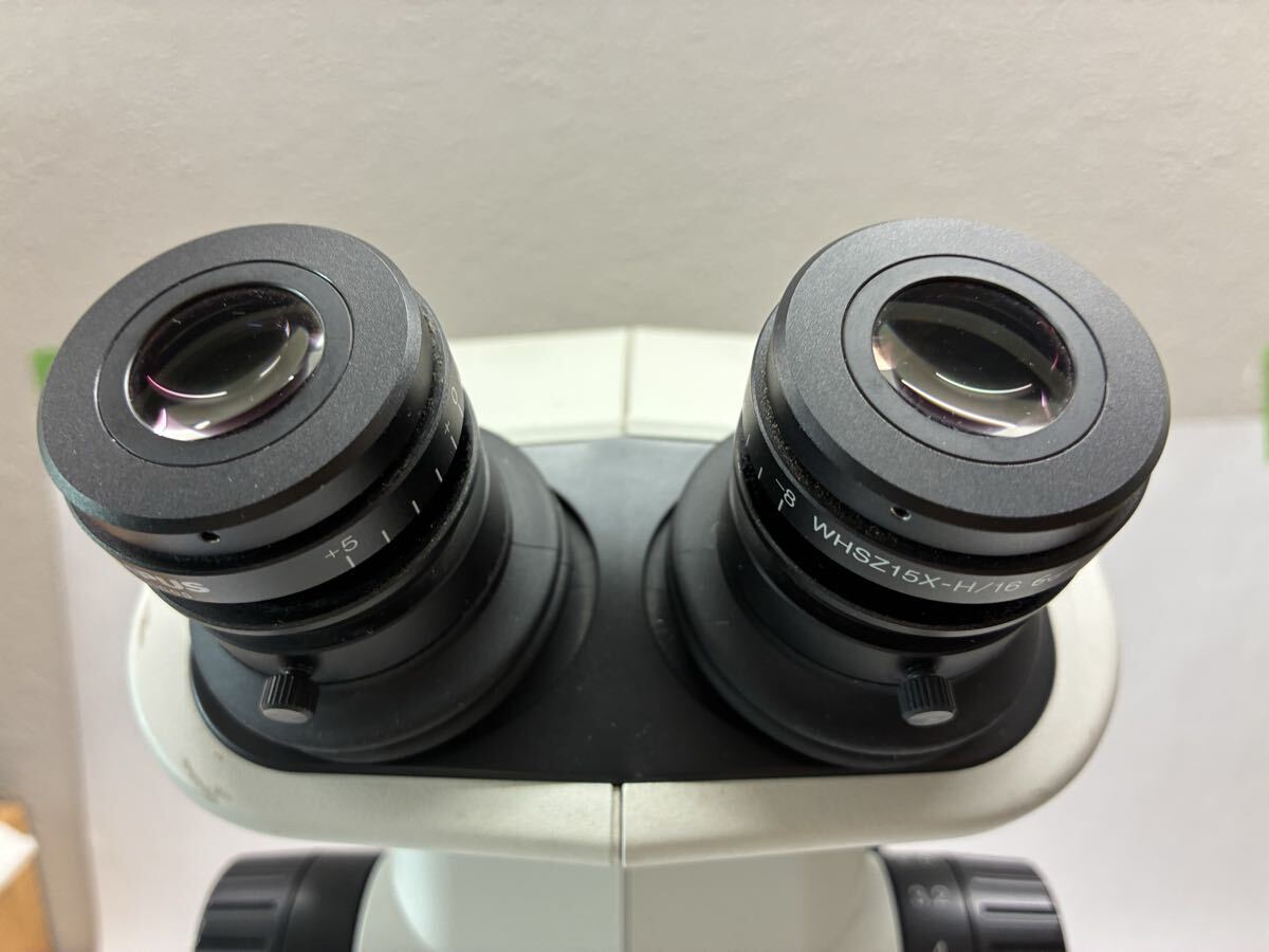 Olympus SZX7 Microscope with WHSZ15X-H/16 Eyepiece and ACH 1X Objective Lens [t1247701283]