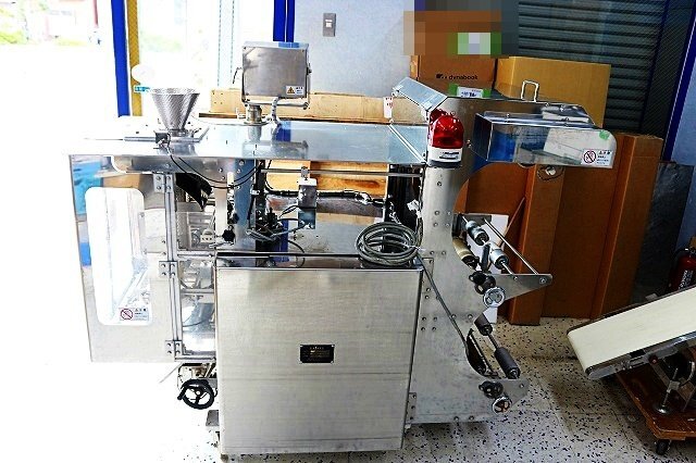 Daiken DK-5500AS Vertical Pillow Packaging Machine with Belt Conveyor [w1235436937]