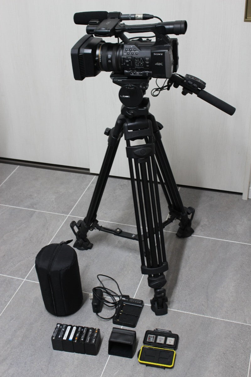 Sony FDR-AX1 4K Video Camera with Tripod Set [f1236263080]